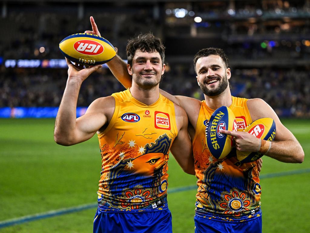 Tom Barrass and Josh Rotham celebrate a win in Round 10. Picture: Daniel Carson/AFL Photos via Getty Images.