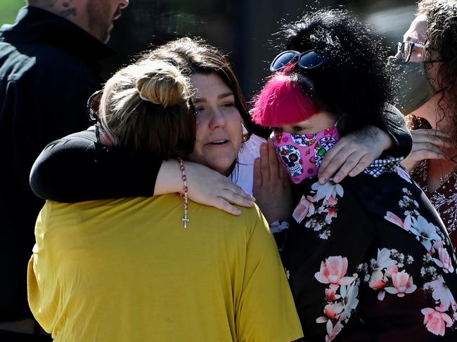 Georgie Gardam, centre, is comforted at the funeral of her son Zane Mellor at the Mersey Gardens Chapel and Crematorium. Picture: AAP