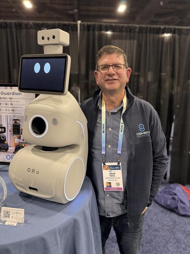 Ogmen Robotics chief commercial officer Arun Koul with the Oro robot.