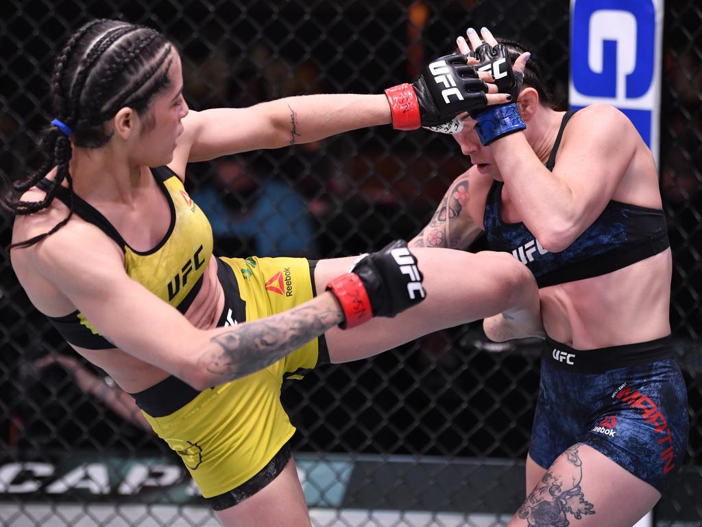 Polyana Viana kicks Mallory Martin. (Photo by Jeff Bottari/Zuffa LLC via Getty Images)