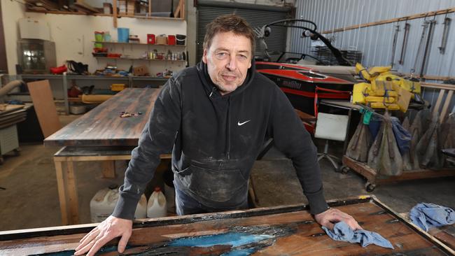 Former Geelong and Essendon coach Mark Thompson at his new workplace in Airport West. Picture: Alex Coppel