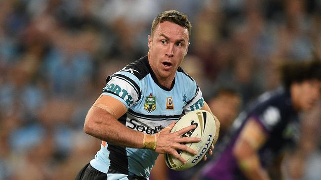 James Maloney of the Sharks runs the ball during the NRL Grand Final between the Melbourne Storm and the Cronulla-Sutherland Sharks at ANZ Stadium in Sydney, Sunday, Oct. 2, 2016. (AAP Image/Dan Himbrechts) NO ARCHIVING, EDITORIAL USE ONLY