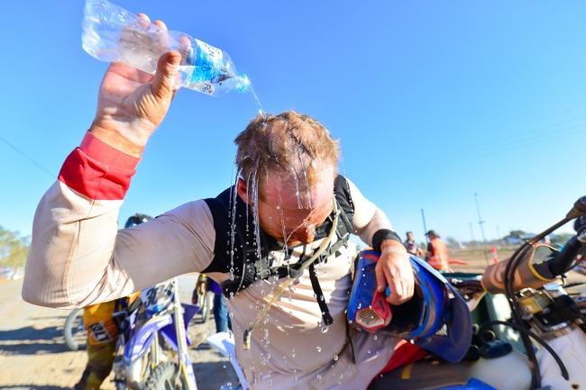 Finke competitors were quick to try and cool down after completing the famous race on Monday. Pic: MATT HENDERSON