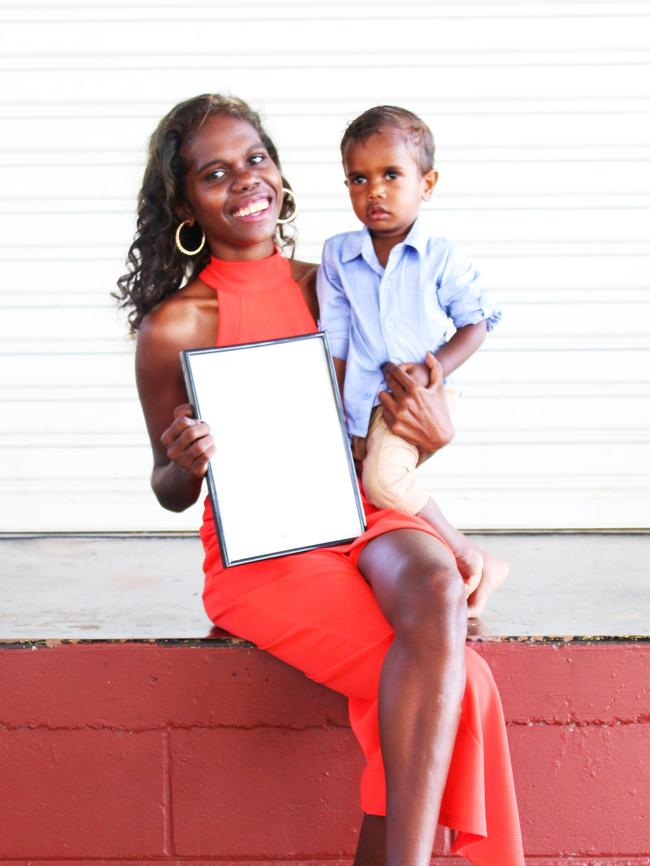 Gunbalanya student Victoria Lansen says she was motivated to finish school to give her son Victor, 3, a better future. Picture: Ivan Rachman