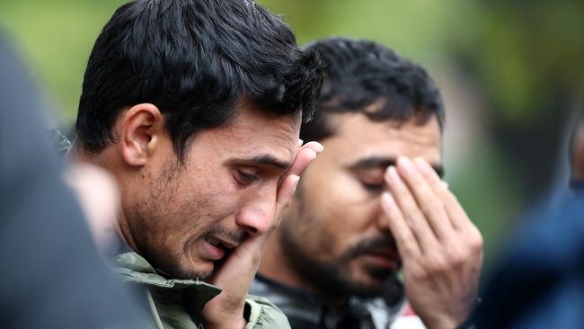 Friends and family of the victims wait near Christchurch Hospital for news. Picture: Getty