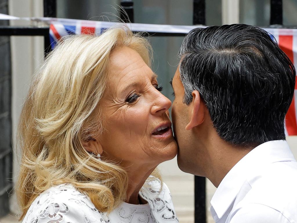 Britain's Prime Minister Rishi Sunak (R) welcomes US Lady Jill Biden (L) for a Coronation Big Lunch organised in Downing Street, in London. Picture: AFP