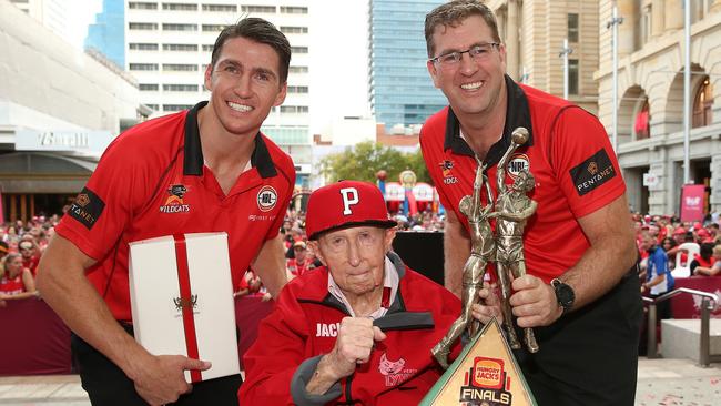 Perth Wildcats capatin Damian Martin, with team owner Jack Bendat and coach Trevor Gleeson after winning their ninth NBL championship in Forrest Place. Picture: Paul Kane/Getty