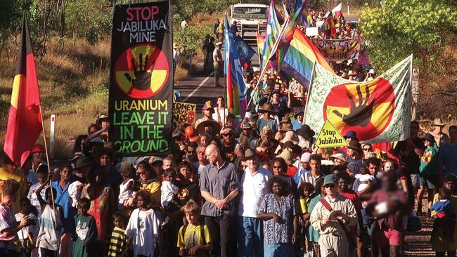 In 1998 more than 5000 people including Peter Garrett joined with Mirarr Traditional Owners to block the Jabiluka mine, owned by Energy Resources of Australia.