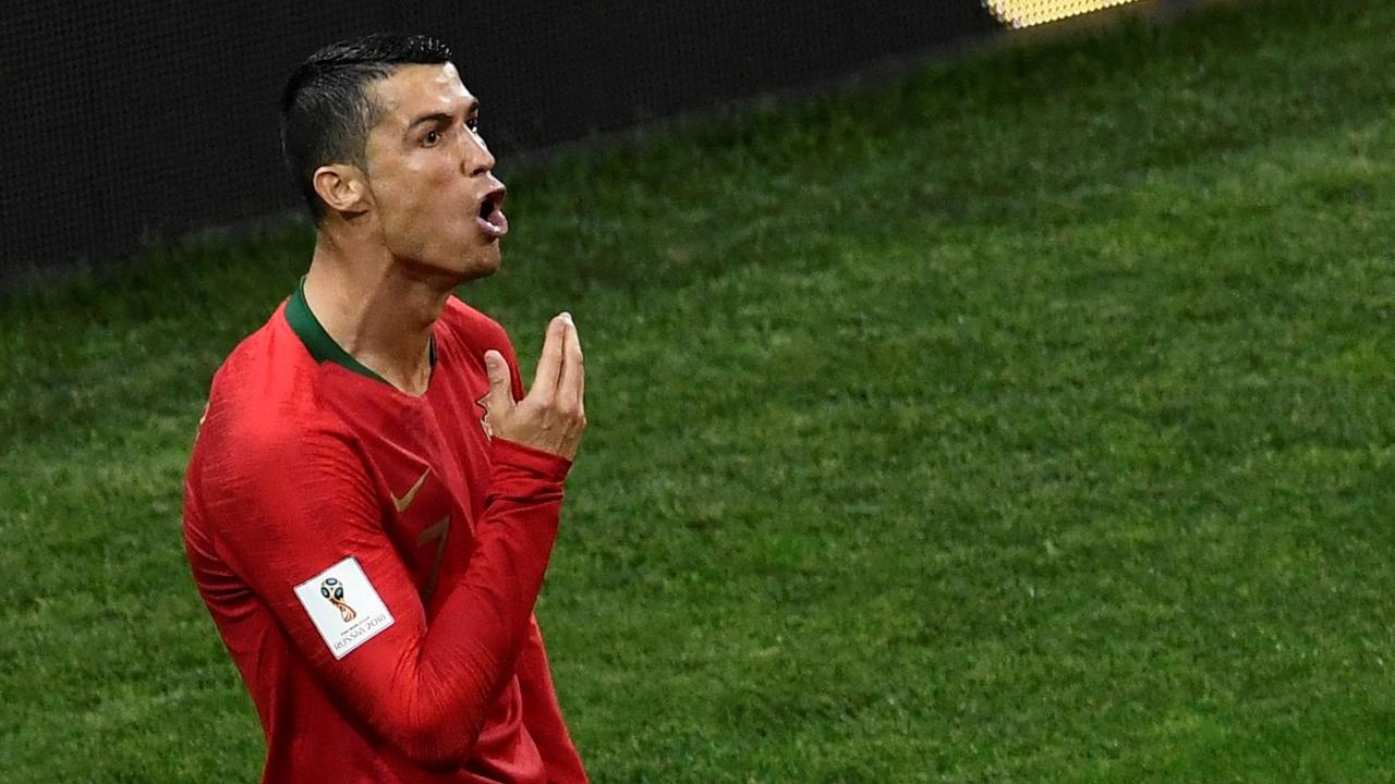 Portugal's forward Cristiano Ronaldo celebrates his first goal against Spain.