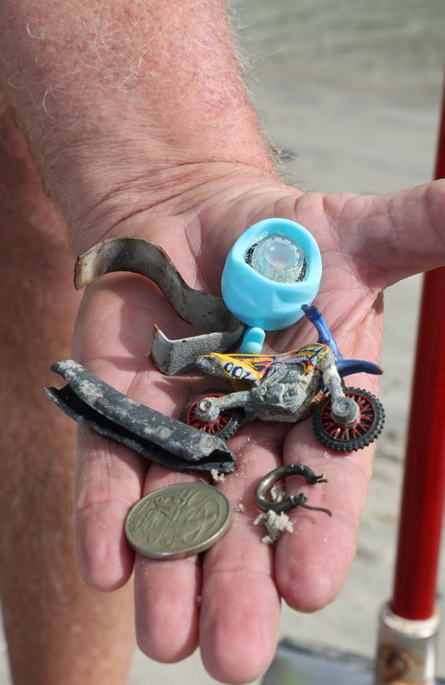 Mr Egan uses his metal detector skills to help reunite people with their valuables. Picture Glenn Hampson