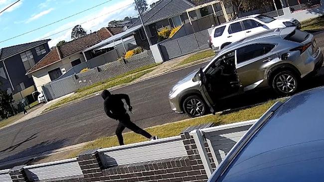 CCTV released by NSW Police of the gunman who carried out the double murders. He remains outstanding.