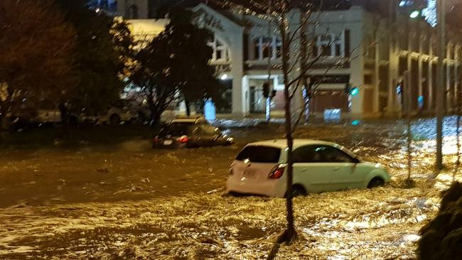 Flooding on Campbell and Macquarie streets, near the Hope and Anchor Tavern. Picture: GEORGE VICKERS