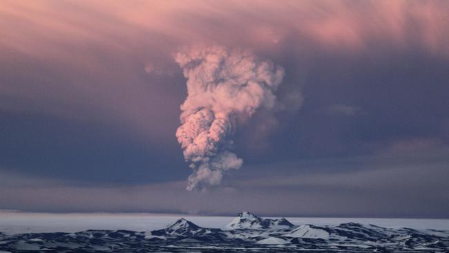 Red alert ...  a file photo shows smoke plumes from a volcano under the Vatnajokull glacier.