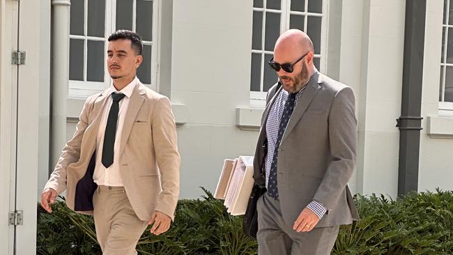 Abhishesh Bista arriving at Rockhampton courthouse with solicitor Grant Cagney ahead of his trial in the Rockhampton District Court on February 10, 2025, where he entered pleas of not guilty to four counts of indecent treatment of children and two of sexual assault.