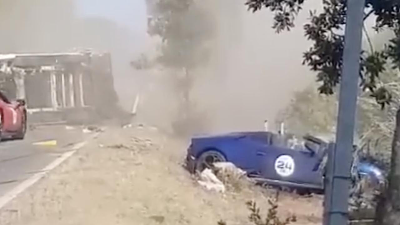 The blue Lamborghini was left in a ditch. Picture: Jam Press Vid
