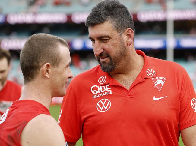 SYDNEY, AUSTRALIA - MAY 04: Chad Warner of the Swans speaks to Dean Cox, coach of the Sydney Swans after the round eight AFL match between Sydney Swans and GWS Giants at Sydney Cricket Ground, on May 04, 2025, in Sydney, Australia. (Photo by Darrian Traynor/AFL Photos/via Getty Images)