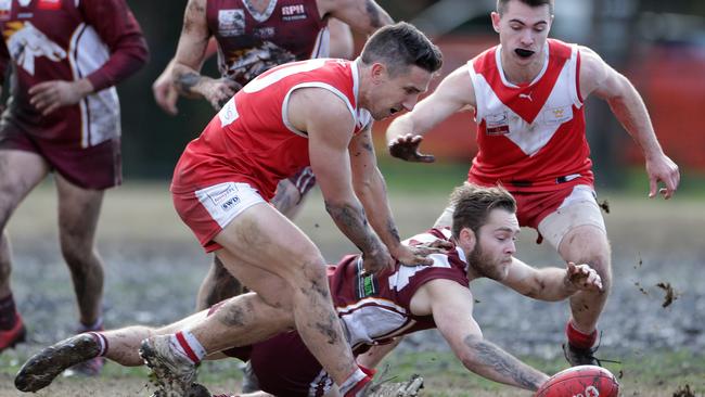 Warrandyte’s Michael Cullum hunts the footy. Picture: Sarah Matray