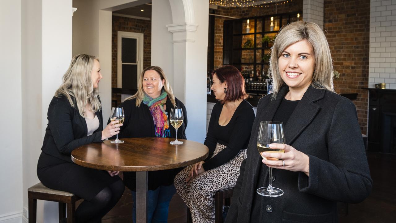 Mikaela Smith (front) of Social Me gets ready for the first function with (back, from left) Fiona Gersekowski, Sarah Berry and Kristy Carroll at Fitzy's. Picture: Kevin Farmer