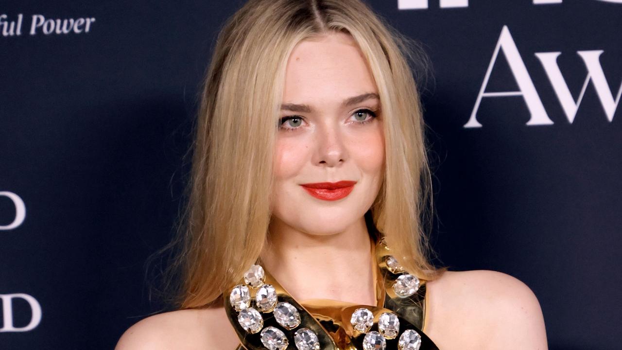 Elle Fanning Wore a Giant Gold Chain Crop Top in Los Angeles