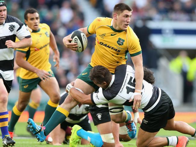 Sean McMahon makes a break for the Wallabies.