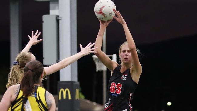 Saints' Mili Liriges shifts the ball around in the Cairns Netball match between North Cairns Tigers and Cairns Saints. PICTURE: BRENDAN RADKE.