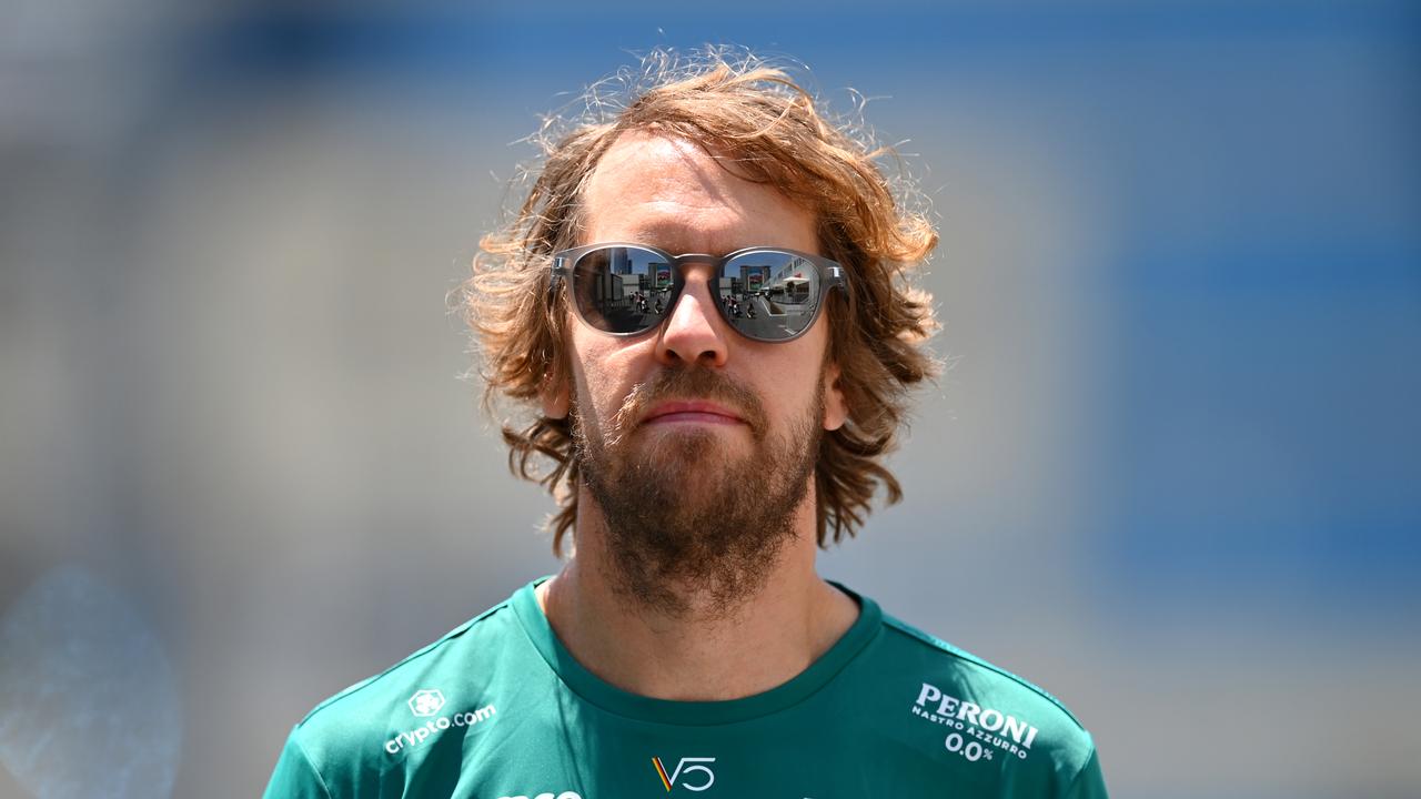 BAKU, AZERBAIJAN - JUNE 09: Sebastian Vettel of Germany and Aston Martin F1 Team walks in the Paddock during previews ahead of the F1 Grand Prix of Azerbaijan at Baku City Circuit on June 09, 2022 in Baku, Azerbaijan. (Photo by Dan Mullan/Getty Images)