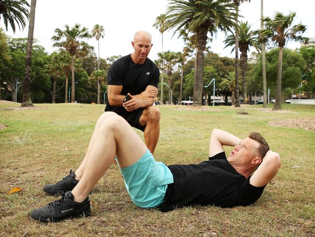 Tom Tilley says reconnecting with your inner child is a smart way to lose weight, pictured training with SundayFit’s Adam McDougall. Picture: Tim Hunter