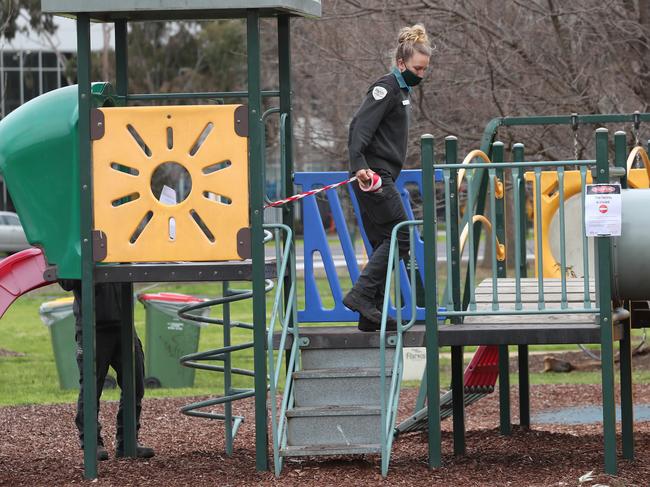 MELBOURNE, AUSTRALIA - NewsWire Photos, AUGUST 17, 2021. Parks staff close down a children's park in Albert Park during a COVID-19 lockdown in Melbourne. NCA NewsWire / David Crosling