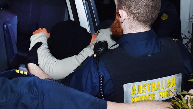 Jagdeep Singh is arrested at his house in Lalor. Picture: Rob Leeson.