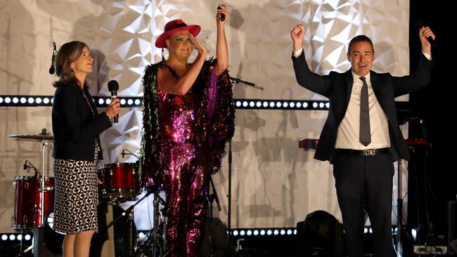 Chief public health officer Nicola Spurrier, Hans and South Australian Premier Steven Marshall on stage after Adelaide cabaret performer Hans performs for hotel guests. Picture: Kelly Barnes/Getty Images)