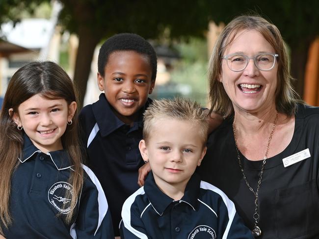 10/2/23. News Corp's Australia's Best Teachers campaign - Elizabeth Vale Primary School principal Julie Murphy.  Lily Byrt (6), Truphena Singirankabo (6), Harrison Rigney (5) and Julie at school.Picture: Keryn Stevens