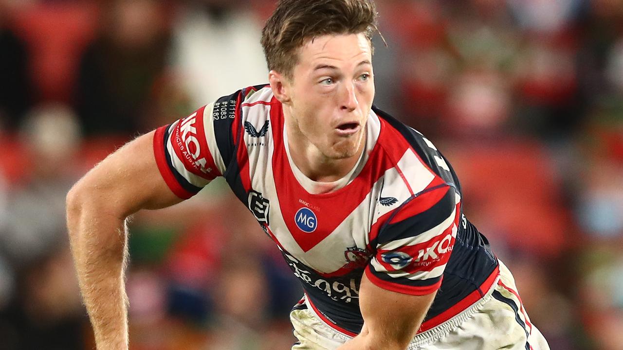 BRISBANE, AUSTRALIA - AUGUST 27: Sam Verrills of the Roosters offloads the ball during the round 24 NRL match between the Sydney Roosters and the South Sydney Rabbitohs at Suncorp Stadium on August 27, 2021, in Brisbane, Australia. (Photo by Chris Hyde/Getty Images)