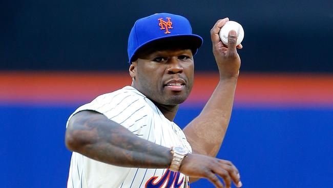 NEW YORK, NY - MAY 27: Rap artist 50 Cent throws the ceremonial first pitch of a game between the New York Mets and the Pittsburgh Pirates at Citi Field on May 27, 2014 in the Flushing neighborhood of the Queens borough of New York City. Jim McIsaac/Getty Images/AFP == FOR NEWSPAPERS, INTERNET, TELCOS & TELEVISION USE ONLY ==