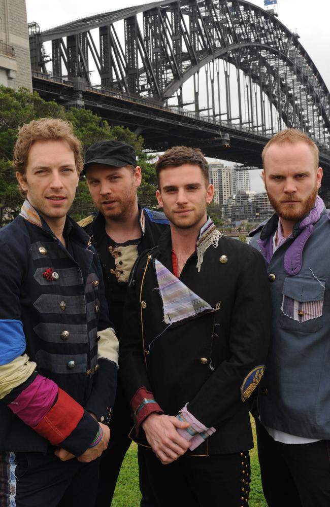 Coldplay giving their best blue steel under the Harbour Bridge steel arches. Picture: Tony Mott