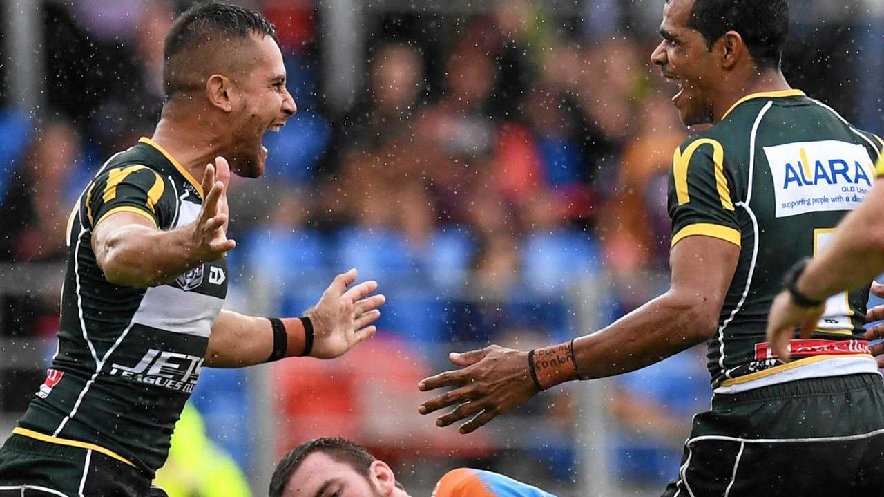 Ipswich Jets speedsters Michael Purcell (right) and Marmin Barba celebrate one of Purcell&#39;s two tries in last weekend&#39;s win over Northern Pride. Picture: Rob Williams