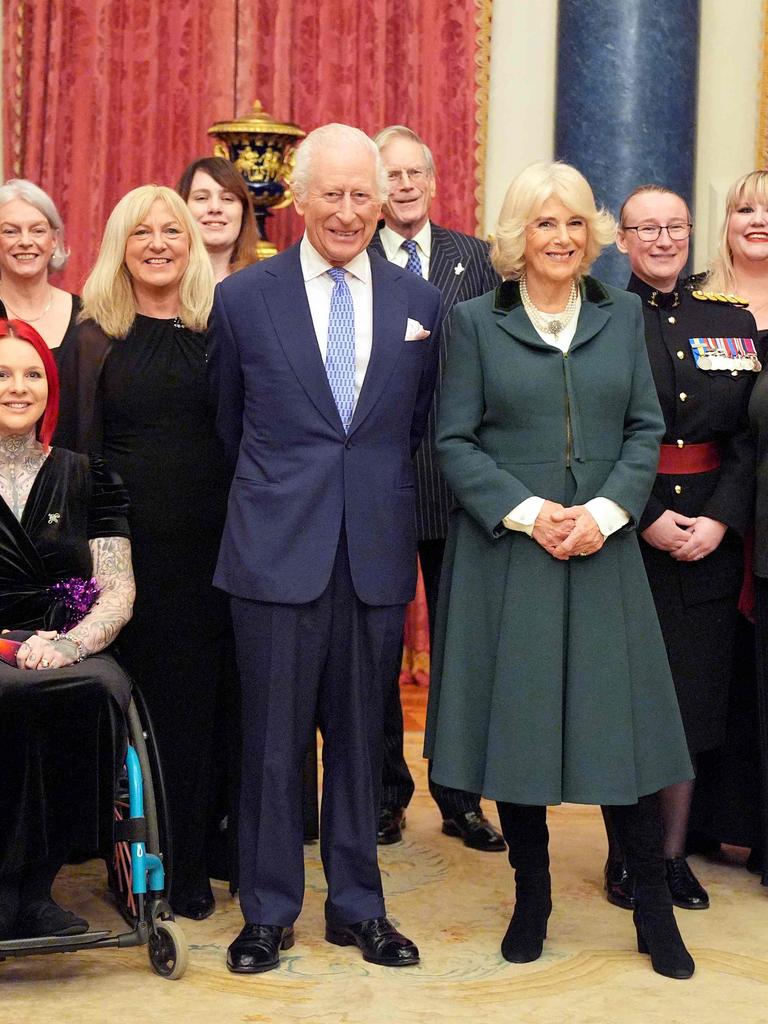 King Charles and Queen Camilla with members of the The Military Wives Choirs at Buckingham Palace where they will be performing their latest single 'November Sunday'. Picture: AFP