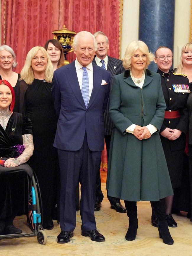 King Charles and Queen Camilla with members of the The Military Wives Choirs at Buckingham Palace where they will be performing their latest single 'November Sunday'. Picture: AFP