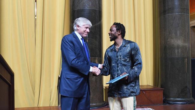 Kendrick Lamar accepts the 2018 Pulitzer Prize for Music from former Columbia University President Lee Bollinger. Picture: Eileen Barroso/Columbia University