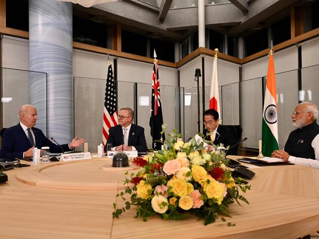 (L-R) US President Joe Biden, Australia's Prime Minister Anthony Albanese, Japan's Prime Minister Fumio Kishida, and India's Prime Minister Narendra Modi hold a quad meeting on the sidelines of the G7 Leaders' Summit in Hiroshima on May 20, 2023. (Photo by Kenny HOLSTON / POOL / AFP)