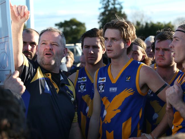 Somerville coach Brad Canavan addresses his players against Red Hill last season. Picture: David Crosling