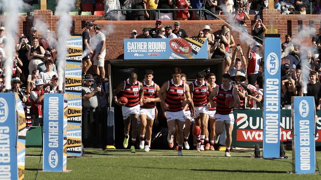 St Kilda players run on to Norwood Oval during the Gather Round AFL match against the GWS Giants at Norwood Oval in April. Picture: Maya Thompson/AFL Photos/Getty