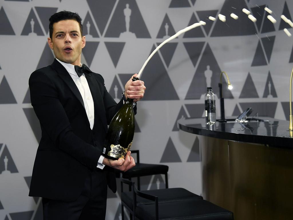 Rami Malek celebrates with some champers at the attends the 91st Annual Academy Awards Governors Ball. Picture: Kevork Djansezian/Getty Images/AFP 