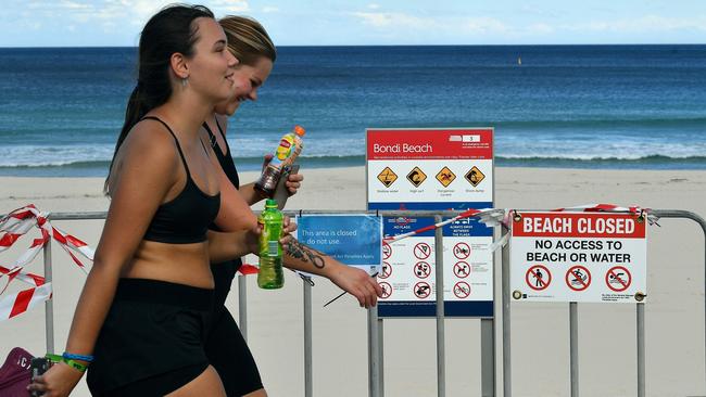 Beachgoers stay out of the water and off the beach at Bondi to deal with the COVID-19 pandemic.