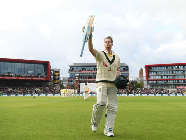 MANCHESTER, ENGLAND - SEPTEMBER 05: Australia batsman Steve Smith acknowledges the applause whilst leaving the field after being dismissed for 211 runs during day two of the 4th Ashes Test Match between England and Australia at Old Trafford on September 05, 2019 in Manchester, England. (Photo by Stu Forster/Getty Images)