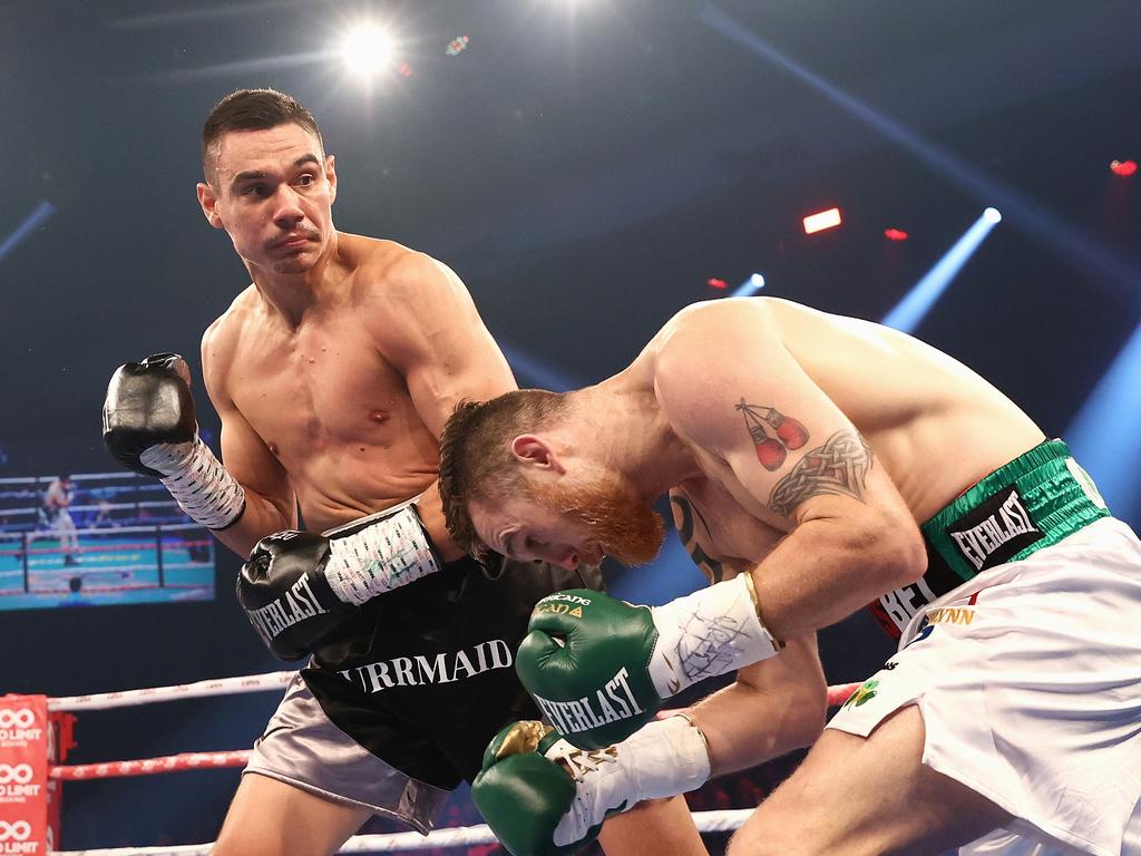 Tim Tszyu punches Dennis Hogan.