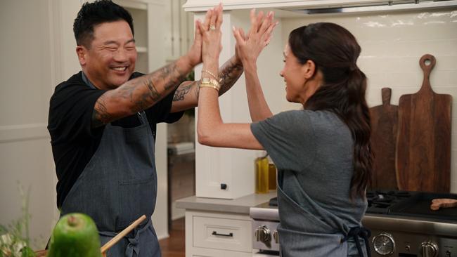 Meghan Markle in the kitchen with chef Roy Choi in an episode of With Love, Meghan on Netflix. Choi co-hosts The Chef Show on Netflix. Picture: Netflix