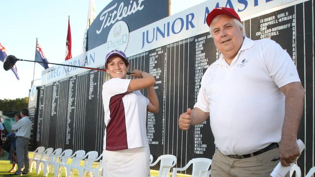 Clive Palmer, right, with Anna Stanton at Palmer Colonial Golf Course for The Greg Norman Junior Masters.