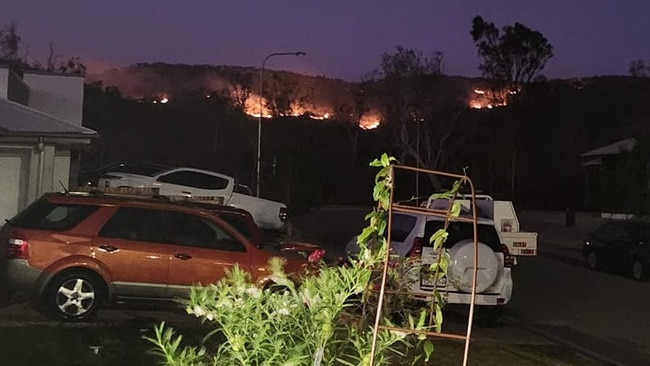 A bushfire burning close to homes on the outskirts of Townsville on Sunday. Picture: Supplied