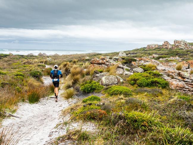 A participant competes during a past takayna Trail marathon event.