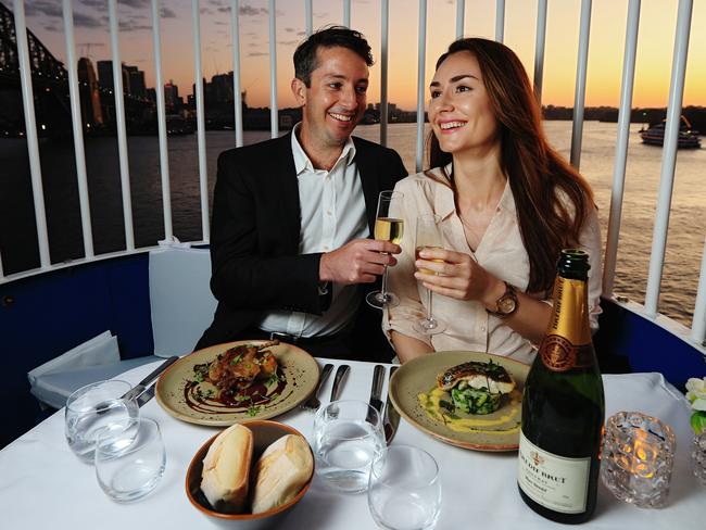 Brendan McDowell and Ange Simich enjoy the views overlooking Sydney Harbour / Picture: Toby Zerna